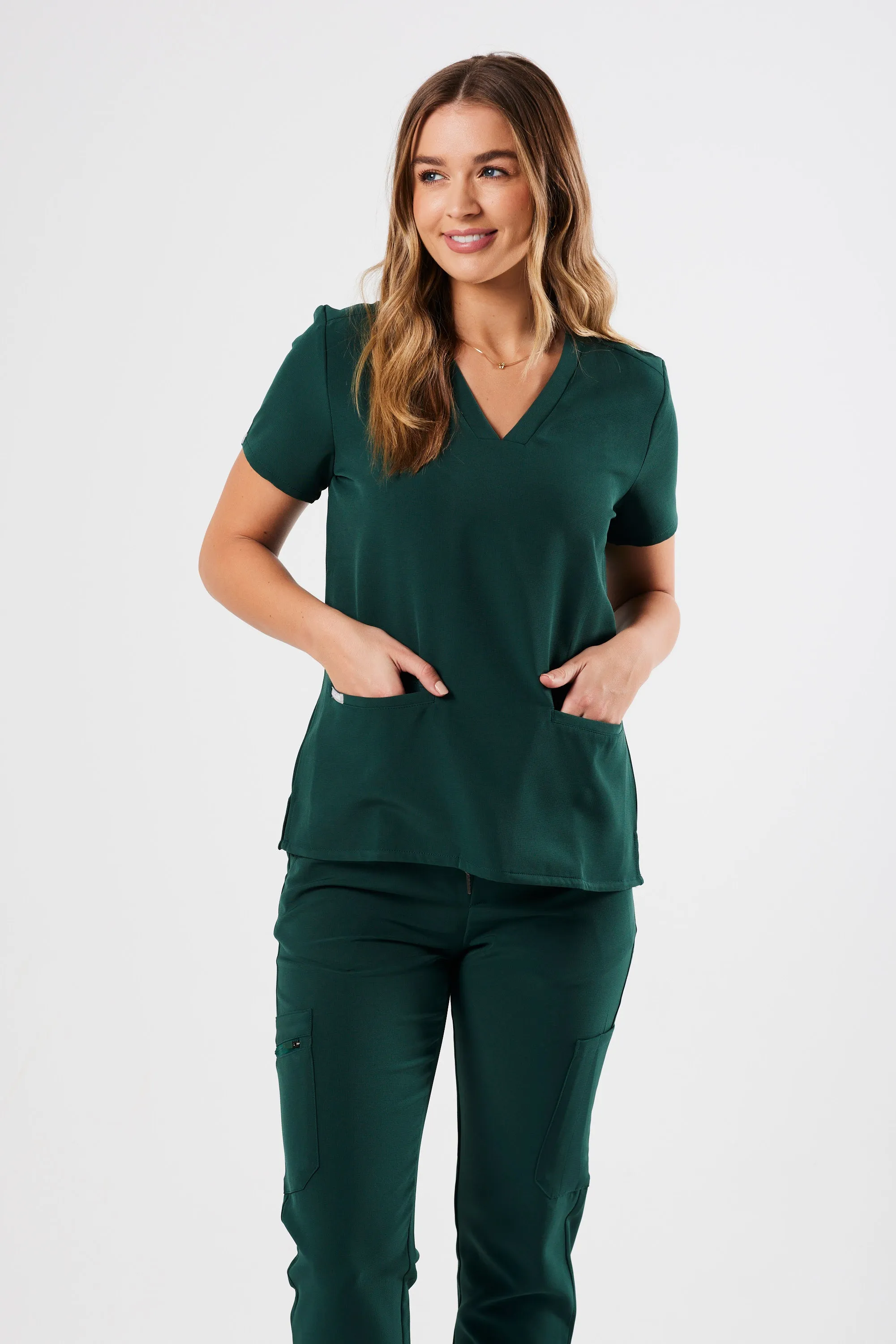 FLEX TWO-POCKET WOMEN'S SCRUB TOP (EMERALD GREEN)